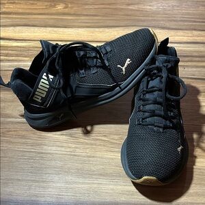 Puma Black and Gold Sneakers